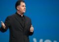 Michael Dell net worth 2026: Dell Technologies founder Michael Dell speaking on stage in 2011